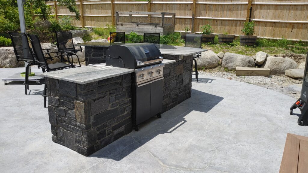 custom yard feature for outdoor grill featuring New England stone