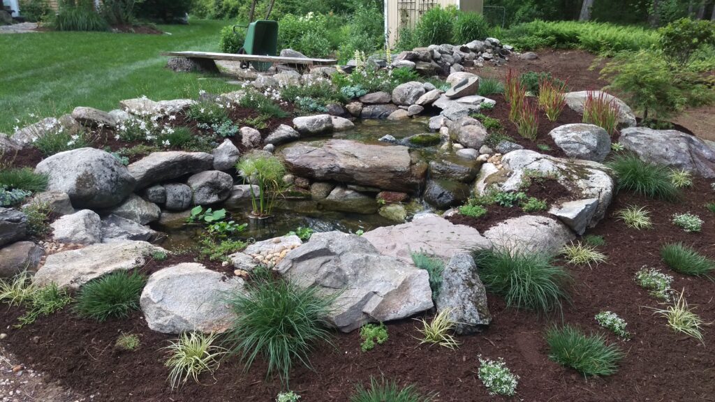 water garden featuring New England stone