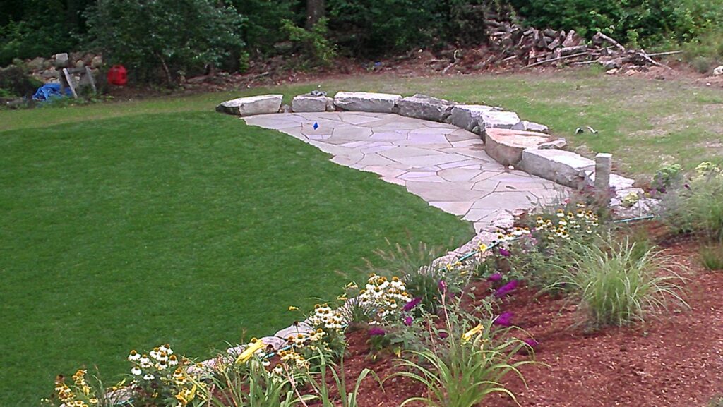 Patio and sitting area featuring New England stone